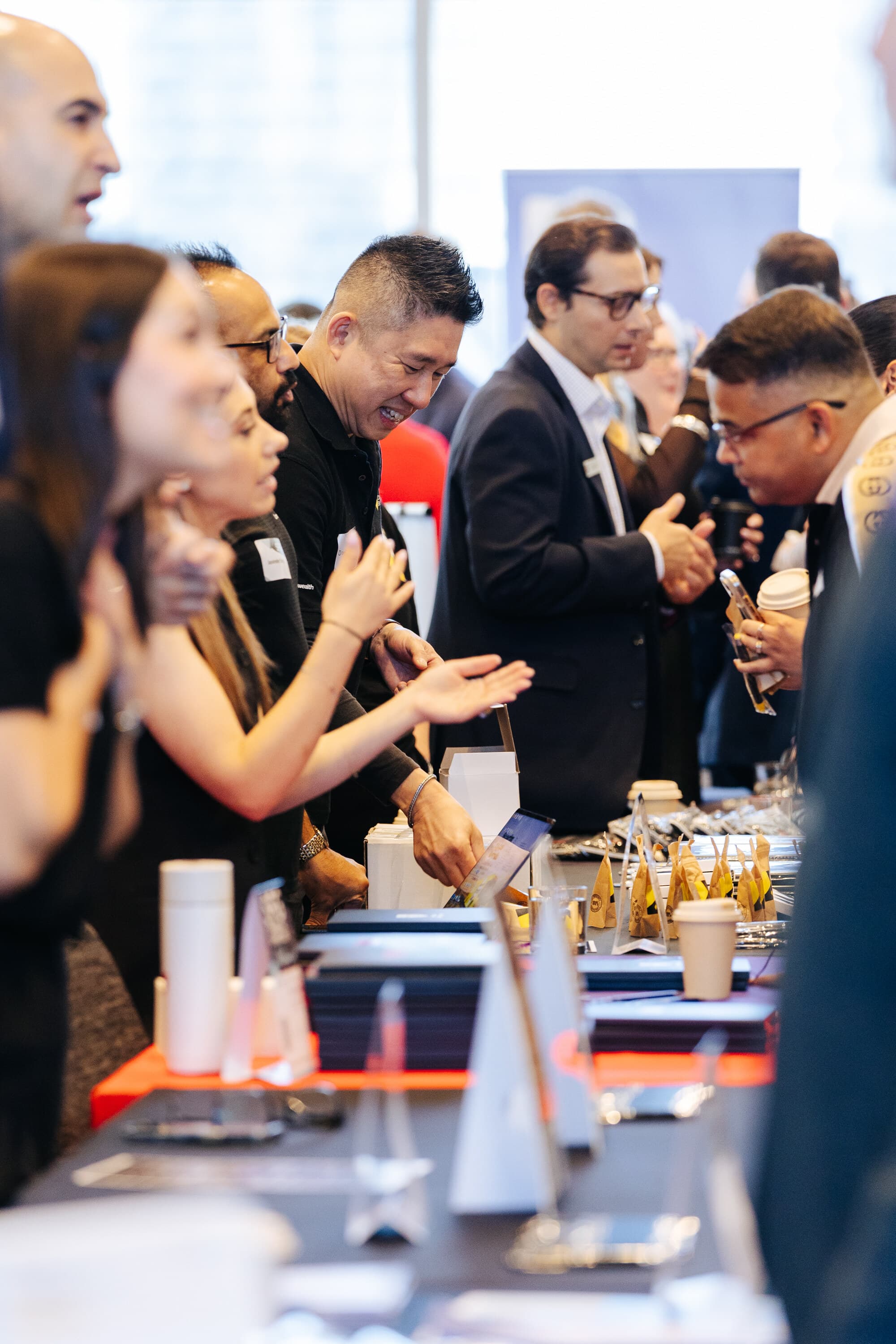 Brokers connecting at an ExBanqi community event
